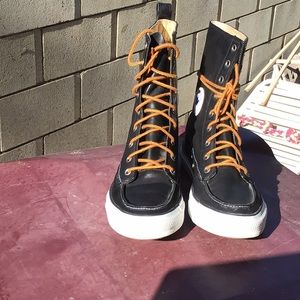 Converse Chuck Taylor black leather high tops